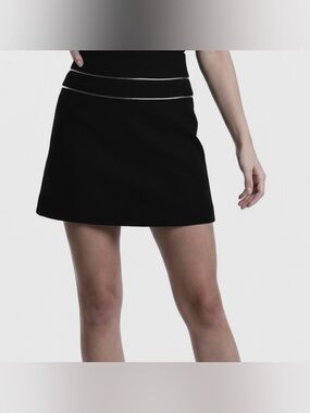 Language Designer Brand Black Mini Skirt with leather tie detail. SLEEK & CHIC